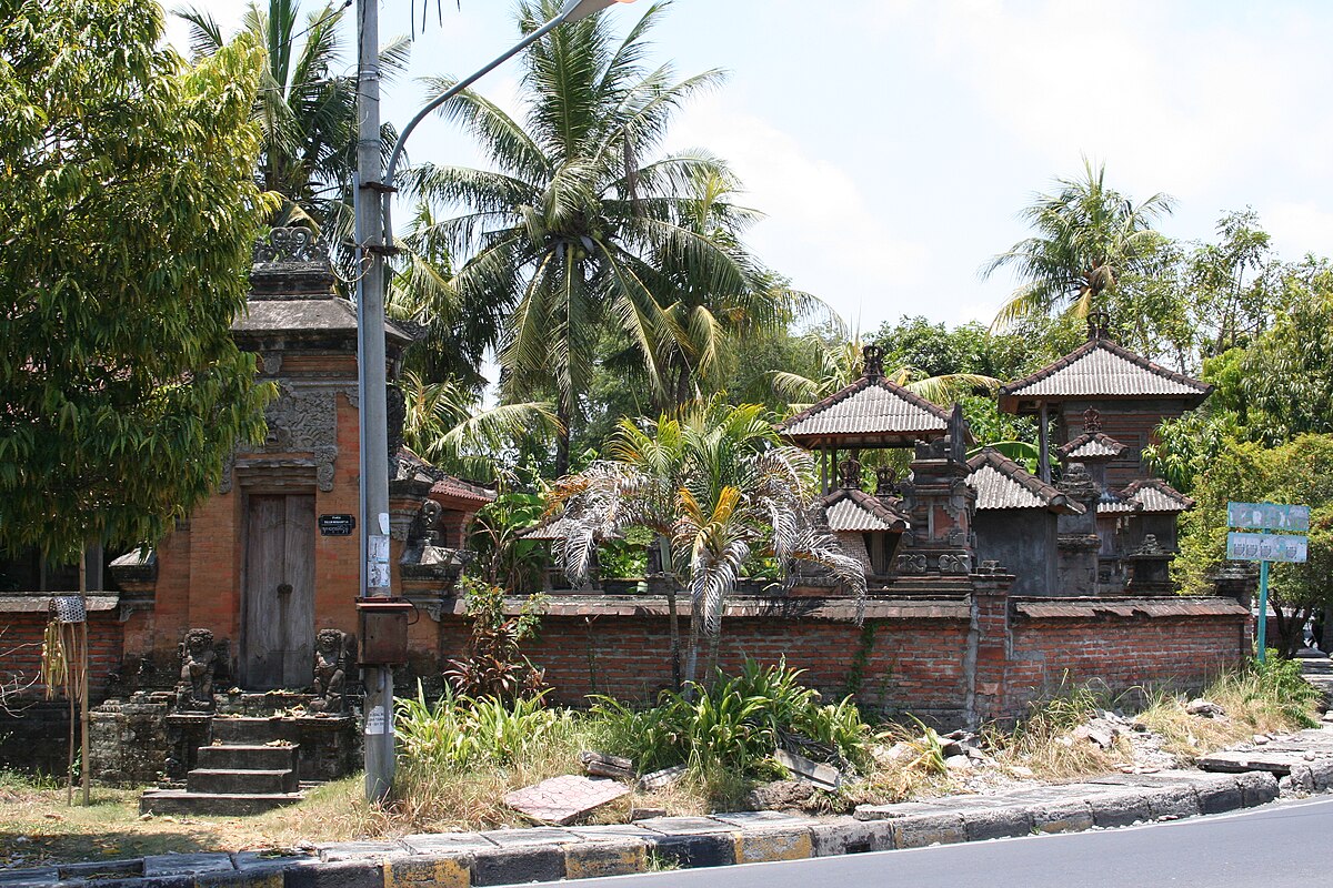 Balinese temple with palm trees
